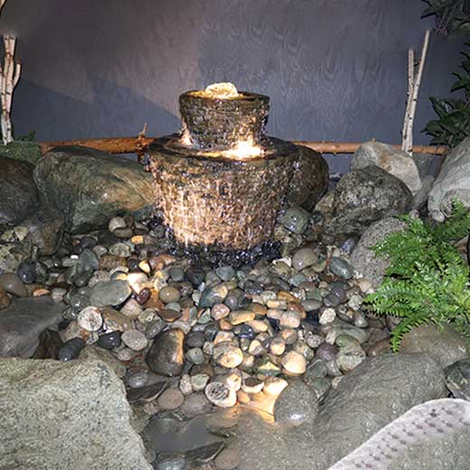 showroom-water-feature-with-river-rock-waterfall-pond-supply